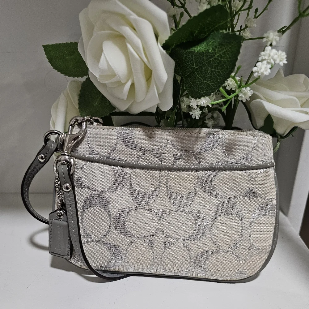 Coach  signature silver wristlet